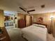 Main bedroom with ensuite bathroom and ample closet space at 128 Lake Hazel Dr, Winter Haven, FL 33884