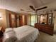 Main bedroom with dresser and large closet at 128 Lake Hazel Dr, Winter Haven, FL 33884