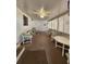 Sunroom with ample seating and a view of the outdoors at 128 Lake Hazel Dr, Winter Haven, FL 33884
