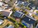 Aerial view of the house and surrounding neighborhood at 1307 Lopez Ln, The Villages, FL 32159