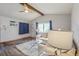 Living room with light-colored sofa and wood-look flooring at 1313 Vine St, Leesburg, FL 34748