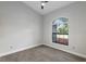 Neutral bedroom with base trim and large window allowing an abundance of natural light at 13819 Sw 109Th Ln, Dunnellon, FL 34432