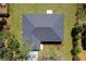 Aerial view of a gray roof with a square back patio at 1511 Moss Ave, Leesburg, FL 34748