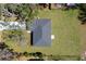 Aerial view of a gray roof with a square back patio at 1511 Moss Ave, Leesburg, FL 34748