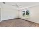 Spacious bedroom with ample natural light and hardwood flooring at 1511 Moss Ave, Leesburg, FL 34748