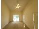 Bedroom with sliding doors opening to a pool view at 16154 Magnolia Hill St, Clermont, FL 34714