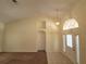 High ceiling entryway with tile floors and coat closet at 16154 Magnolia Hill St, Clermont, FL 34714