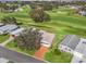 Aerial view showing home's location and landscaping at 1711 Lilly Ln, The Villages, FL 32159