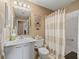 Clean bathroom with shower/tub combo and updated fixtures at 1711 Lilly Ln, The Villages, FL 32159