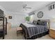 Large main bedroom with a king-size bed and plenty of closet space at 1711 Lilly Ln, The Villages, FL 32159