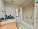 Full bathroom with tub and shower, well-lit at 180 Hibiscus Way, Leesburg, FL 34748