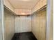 Large walk-in closet with double hanging rods at 180 Hibiscus Way, Leesburg, FL 34748