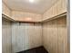 Large closet with shelving and hanging rods at 180 Hibiscus Way, Leesburg, FL 34748