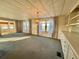 Bright dining room with chandelier and built-in hutch at 180 Hibiscus Way, Leesburg, FL 34748