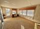 Spacious office with large windows and wood flooring at 180 Hibiscus Way, Leesburg, FL 34748