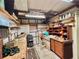 Well-equipped workshop with plenty of storage at 180 Hibiscus Way, Leesburg, FL 34748