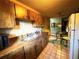 Kitchen with double sink and ample wood cabinetry at 1803 Ne 29Th Pl, Ocala, FL 34479