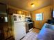 Galley kitchen with wood cabinets and appliances at 1803 Ne 29Th Pl, Ocala, FL 34479