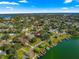 Aerial view showing a house's location on a lake at 2450 Topping Pl, Eustis, FL 32726