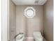 Small half bathroom with toilet and bidet at 2450 Topping Pl, Eustis, FL 32726