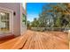 Deck provides backyard access and features a door leading to the interior at 2450 Topping Pl, Eustis, FL 32726