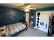 Bright bedroom with a single bed, Star Wars decor, and plenty of storage at 2613 Crest Dr, Haines City, FL 33844