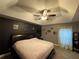 Large main bedroom with a king-size bed and window coverings at 2613 Crest Dr, Haines City, FL 33844