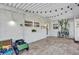 View of an outdoor patio area with tiled floors, a white ceiling, and string lights at 2667 Northland Rd, Mount Dora, FL 32757