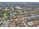 Aerial view showing home's location in a beautiful neighborhood near a lake at 2987 Schoenacher St, The Villages, FL 32163