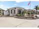 One-story home with gray roof and landscaped yard at 2987 Schoenacher St, The Villages, FL 32163