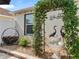 Landscaped garden with fountain and arbor at 2987 Schoenacher St, The Villages, FL 32163