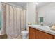 Well maintained bathroom with a single sink vanity and walk in shower at 3001 Saint Thomas Ln, The Villages, FL 32162