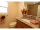 Bathroom boasts granite countertop, modern sink, and a walk-in shower at 3180 Dressendorfer Dr, The Villages, FL 32163