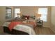 Main bedroom with a comfortable bed and two nightstands at 3180 Dressendorfer Dr, The Villages, FL 32163