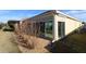 Rear view of house showing sunroom and landscaping at 3180 Dressendorfer Dr, The Villages, FL 32163