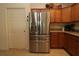 Stainless steel appliances and light wood cabinets highlight this kitchen at 3180 Dressendorfer Dr, The Villages, FL 32163