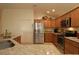 Modern kitchen with stainless steel appliances and granite countertops at 3180 Dressendorfer Dr, The Villages, FL 32163