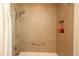 Clean shower with tiled walls and built-in shelf at 3180 Dressendorfer Dr, The Villages, FL 32163