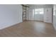 Spacious bedroom with light flooring and built in white closets at 324 N York St, Bushnell, FL 33513