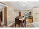 Dining area with wood floors and built-in cabinets at 37610 Quail Ridge Cir, Leesburg, FL 34788