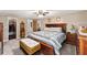 Bedroom with wood furniture and carpet at 37610 Quail Ridge Cir, Leesburg, FL 34788