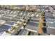 Aerial view of a community of houses, showcasing the neighborhood layout at 3818 Zentko St, The Villages, FL 32163