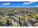 Aerial view of a community with numerous houses and trees at 40 Moree Loop # 1, Winter Springs, FL 32708