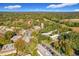 Aerial view of a community featuring numerous buildings surrounded by trees at 40 Moree Loop # 1, Winter Springs, FL 32708