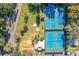 Aerial view showing tennis and pickleball courts at 40 Moree Loop # 1, Winter Springs, FL 32708