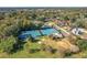 Aerial view of community tennis courts and surrounding area at 40 Moree Loop # 1, Winter Springs, FL 32708