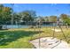 Swings near tennis courts and playground at 40 Moree Loop # 1, Winter Springs, FL 32708