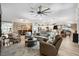 Open concept living room with dining area and kitchen, features recessed lighting and ample natural light at 4515 Biggs Pl, The Villages, FL 32163