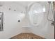 Elegant shower with decorative glass and pebble floor at 4515 Biggs Pl, The Villages, FL 32163