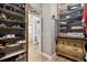 Well-organized walk-in closet with shelving and drawers at 4515 Biggs Pl, The Villages, FL 32163